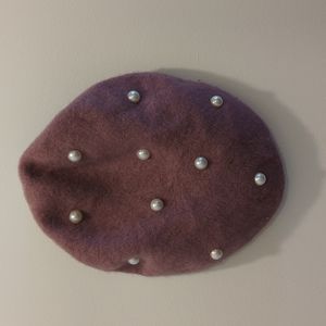 Fuzzy pink beret with faux pearl accents
